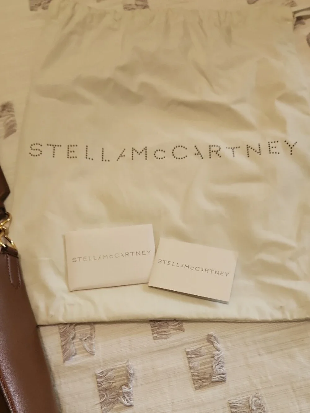 Stella McCartney Mini Brown Perforated Logo Crossbody Bag